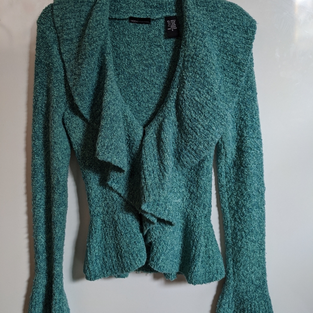 Gorgeous turquoise ruffled sweater